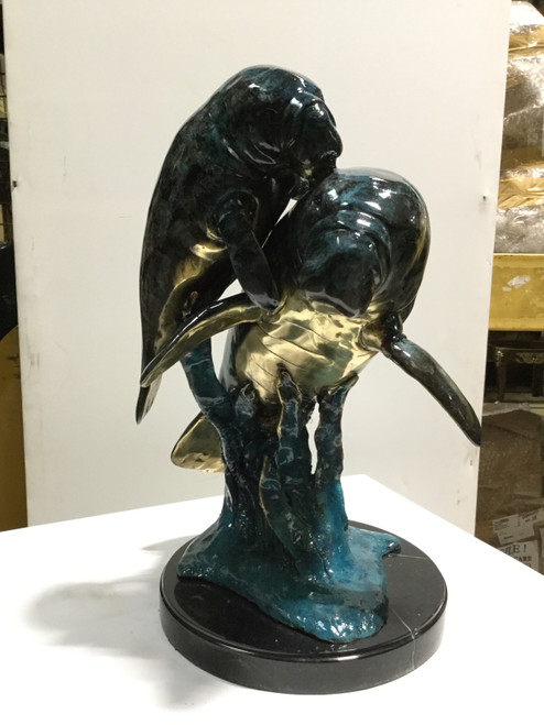 Two Manatees in Special Patina on Marble Base