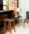 Contoured Seat Suar Wood Counter Stool Room Scene