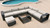 Pembroke Sectional with Ottoman and Coffee Table Patio Seating Set Close Up Image