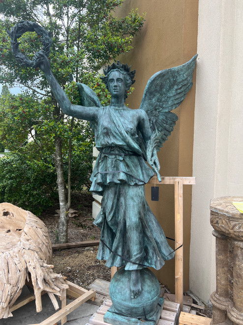 Bronze Lady Statue with Wings Room Scene