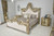 Grand Platine Finish Carved Mahogany Tufted Poster King Bed Room Scene